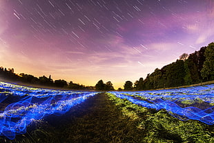 time lapse photography of falling stars