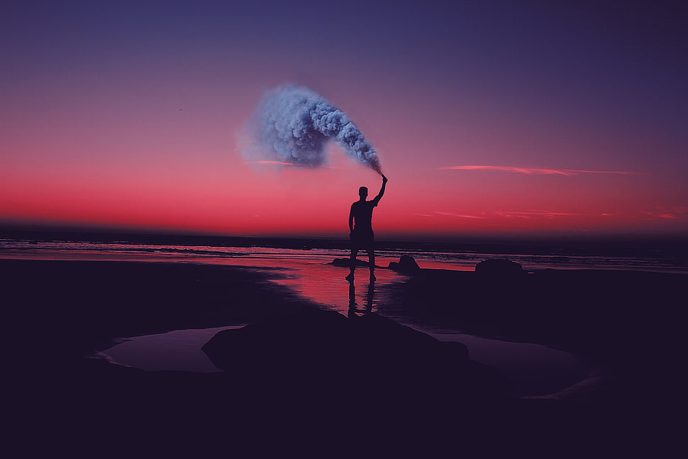 man standing white holding smoke screen during sunset HD wallpaper