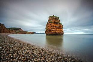 rock formation on sea HD wallpaper
