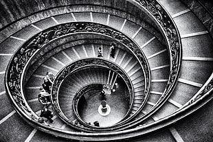 grayscale photo of people walking on spiral staircase HD wallpaper