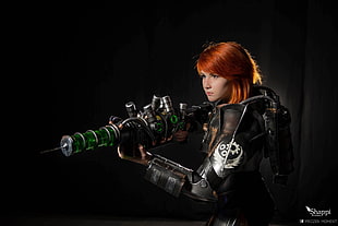 woman wearing combat suit holding rifle HD wallpaper