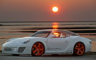 white convertible coupe parking in the middle of sunset HD wallpaper