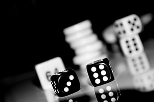 selective focus photography of black dice