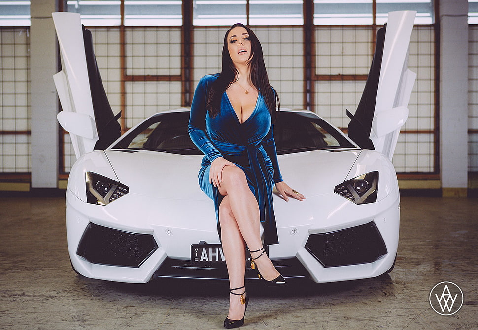 woman in blue plunging neckline dress sitting on white Lamborghini supercar HD wallpaper