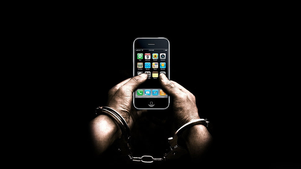 man in cuff links holding black iPod Touch HD wallpaper