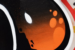 orange and black sticker