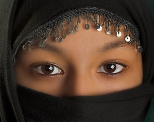 close up photo of a woman wearing hijab