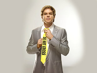 man wearing peak lapel suit jacket and white dress shirt