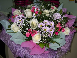 bouquet of white, pink, and green flower