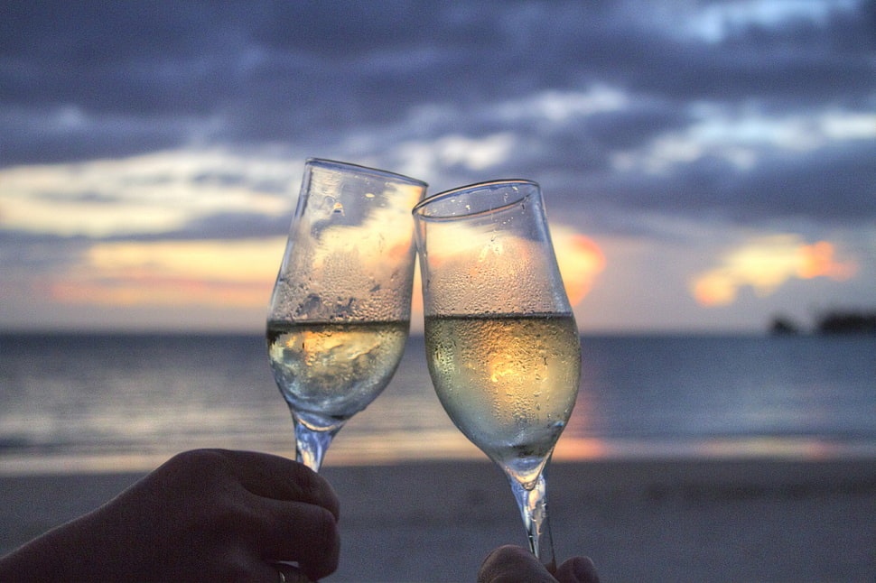 two clear flute champagne glasses HD wallpaper
