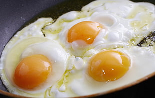 three sunny side up eggs