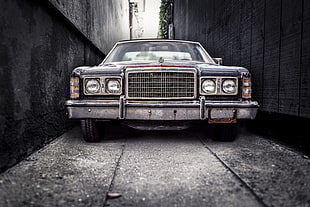 black classic car on narrow street HD wallpaper