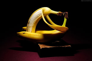 two peeled bananas