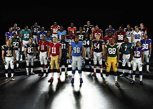 american football players standing inside dark room