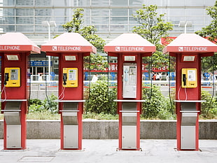four red telephone booths HD wallpaper