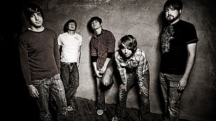 grayscale photo of male band