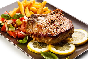 grilled meat, lime and fries food