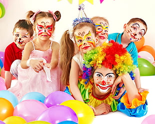 clown with childrens and party balloons