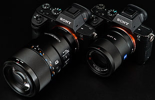 two black Sony DSLR camera wallpaper