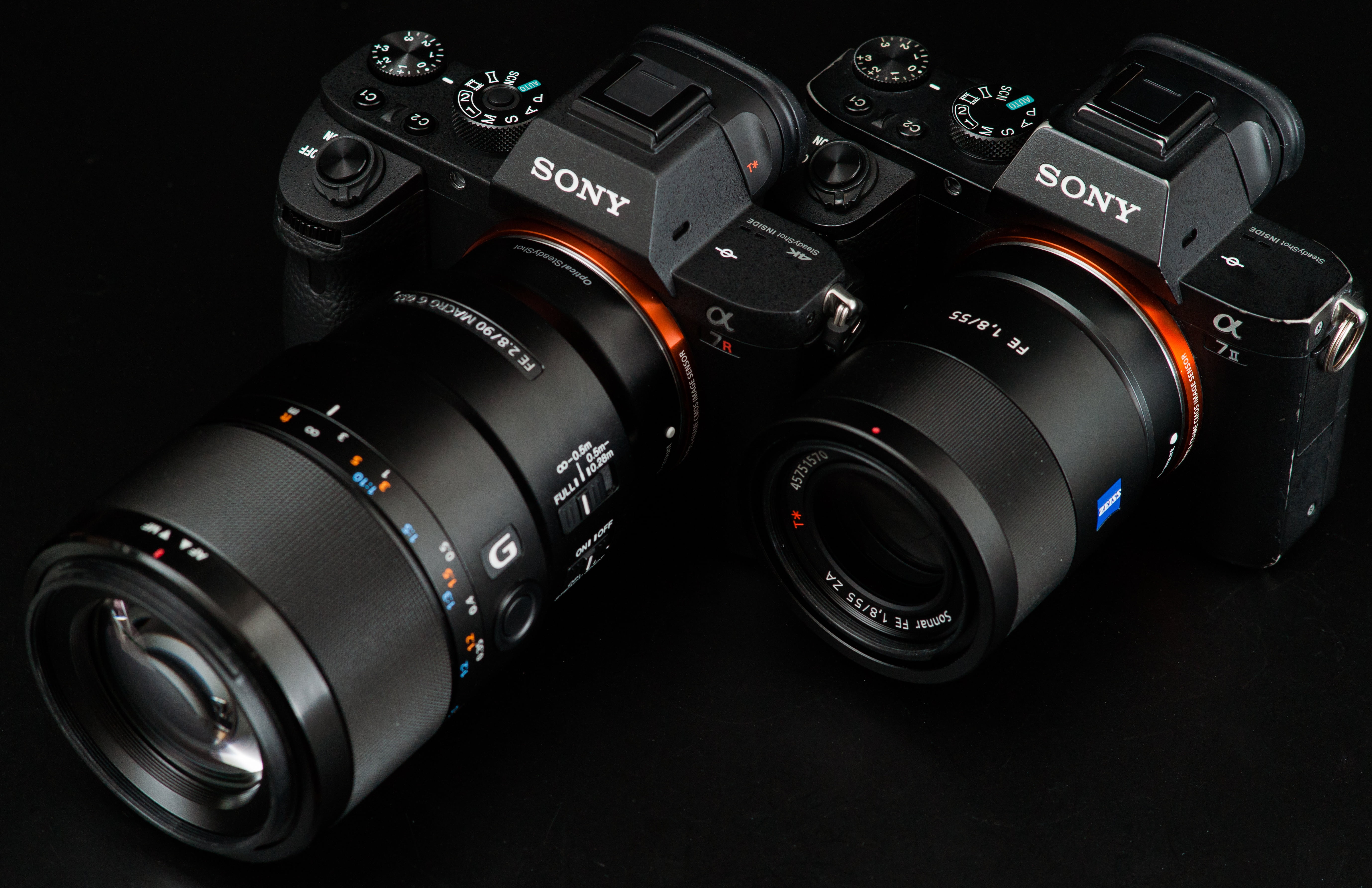 two black Sony DSLR camera wallpaper