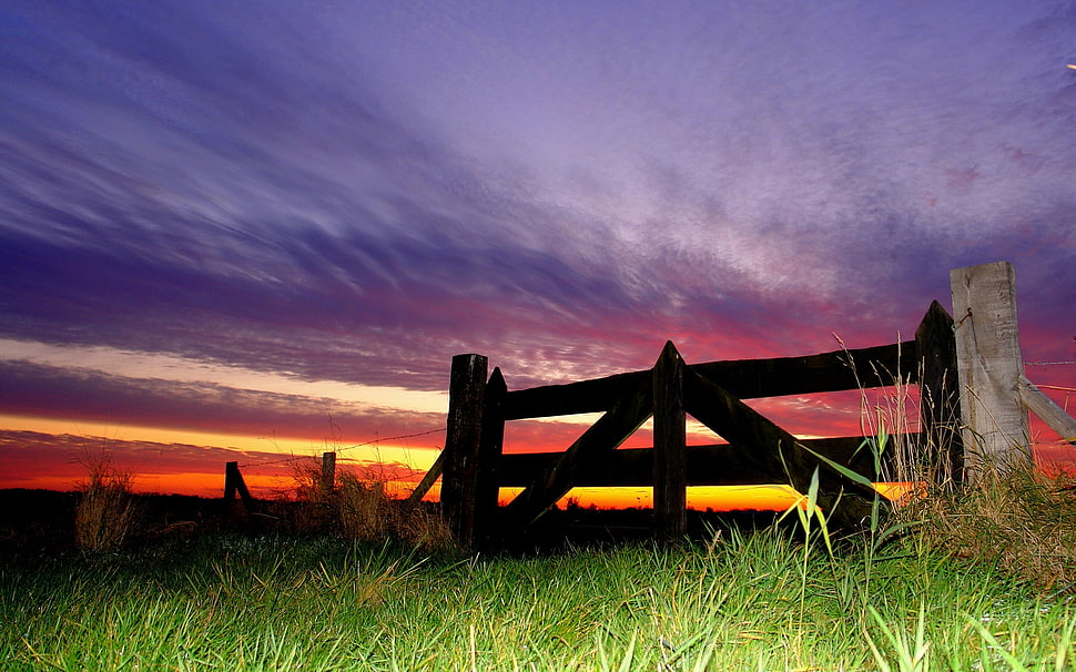 brown wooden fence during sunset HD wallpaper