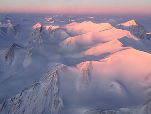 aerial photo of mountain cape by snow
