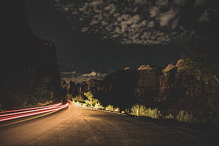 night landscape photography of empty road