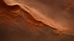 brown wooden handle stainless steel knife, desert, sand, rocks, landscape