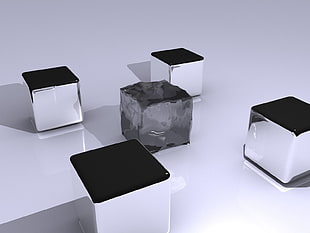 photo of silver-colored cubes