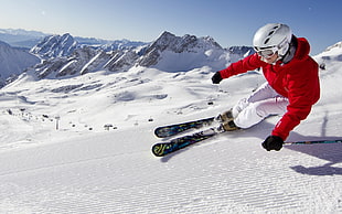 man wearing red hoodie ski blading