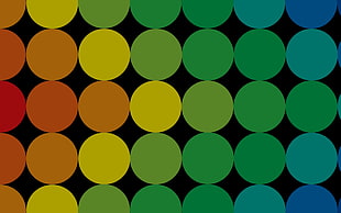 black, green, yellow and orange polka dot illustration