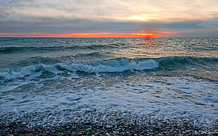 ocean wave photo during sunset