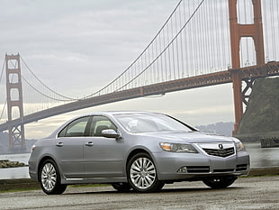 silver Acura sedan parked near Golden Gate bridge at daytime