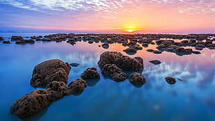 rock formations on body of water during golden hour, coast, water, nature