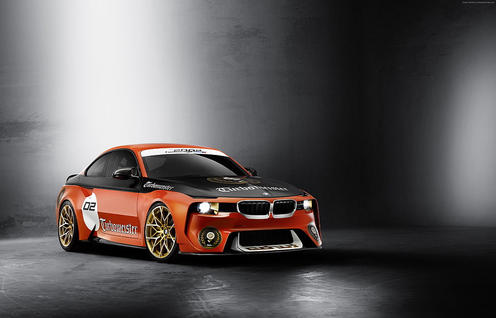 orange and black BMW coupe with vinyl stickers HD wallpaper