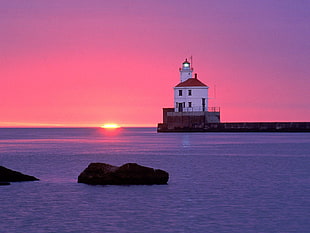 white lighthouse near body of water, coast, lighthouse