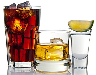 close up photography of three clear glasses filled with beverages