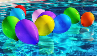 assorted balloons on pool