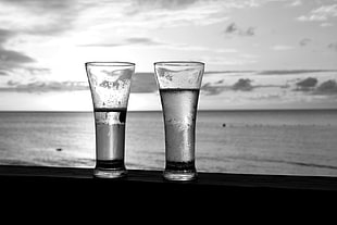 two clear glass candle holders, glasses, beach HD wallpaper