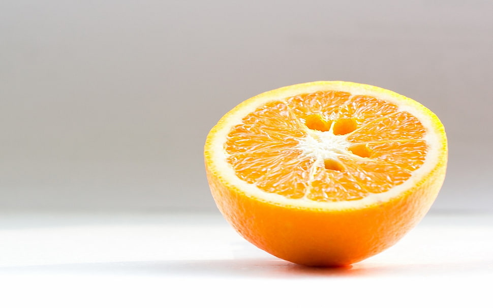 orange fruit on table HD wallpaper