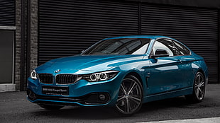 blue BMW coupe sport near building HD wallpaper