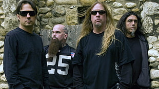 group of men wearing black shirt taking group photo