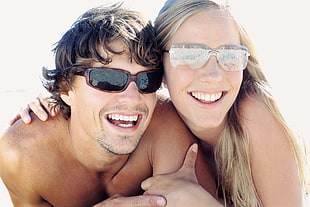 man and woman wearing sunglasses HD wallpaper