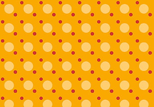 orange, yellow, and red polka dot wallpaper
