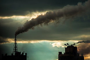 black concrete building, smoke, pollution, cityscape, clouds HD wallpaper