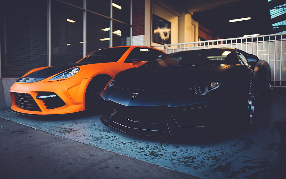two orange and black coupes HD wallpaper
