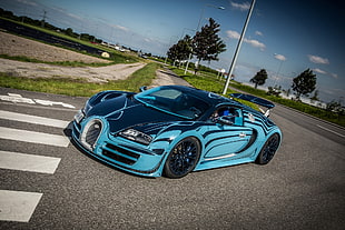 blue and gray Bugatti Veyron sports coupe
