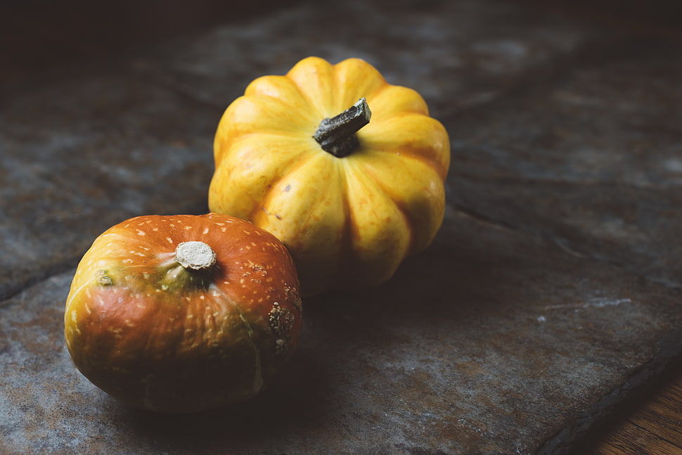 two yellow and orange pumpkins HD wallpaper