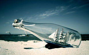 close up photo of ship in impossible bottle
