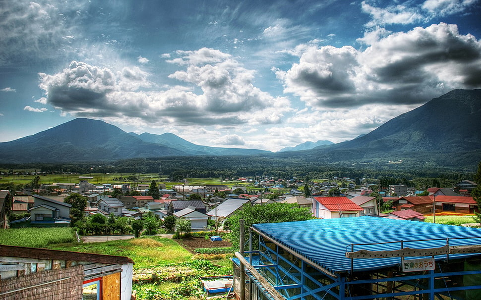 assorted-color house lot, HDR, clouds, mountains, building HD wallpaper